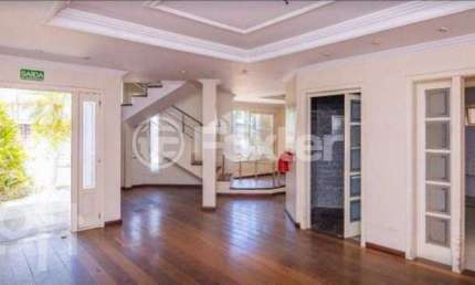 Casa com 3 quartos à venda na Avenida Doutor Sezefredo Azambuja Vieira, 156, Marechal Rondon, Canoas, 438 m2 por R$ 1.840.000