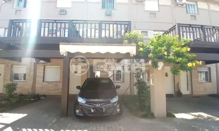 Casa em condomínio fechado com 3 quartos à venda na Avenida Juca Batista, 473, Cavalhada, Porto Alegre, 98 m2 por R$ 399.000