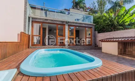 Casa em condomínio fechado com 3 quartos à venda na Rua Erechim, 100, Nonoai, Porto Alegre, 220 m2 por R$ 700.000