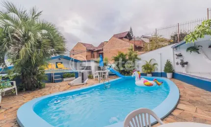 Casa com 4 quartos à venda na Rua Santo Camaratta-Santino, 6, Parque Santa Fé, Porto Alegre, 176 m2 por R$ 742.000