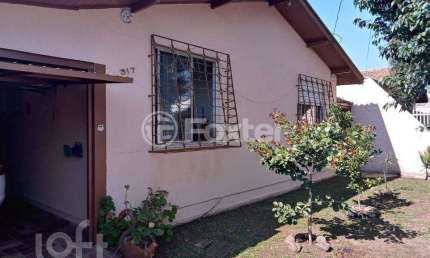 Casa com 3 quartos à venda na Rua Osvaldo Optiz, 317, Estância Velha, Canoas, 190 m2 por R$ 620.000