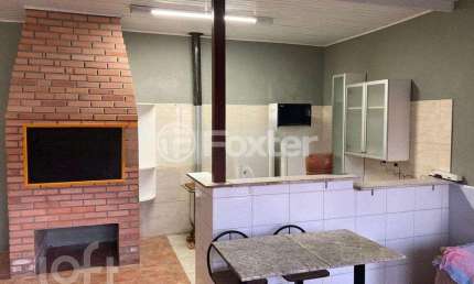 Casa com 3 quartos à venda na Rua Abílio Miller, 194, Jardim Itu Sabará, Porto Alegre, 155 m2 por R$ 849.000