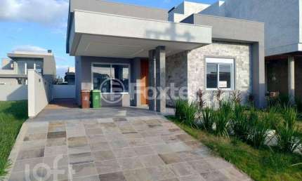 Casa em condomínio fechado com 3 quartos à venda na Rua Jasmim, 1010, São Vicente, Gravataí, 137 m2 por R$ 1.050.000