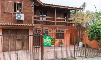 Casa com 4 quartos à venda na Rua Liberal, 1075, Tristeza, Porto Alegre, 107 m2 por R$ 530.000