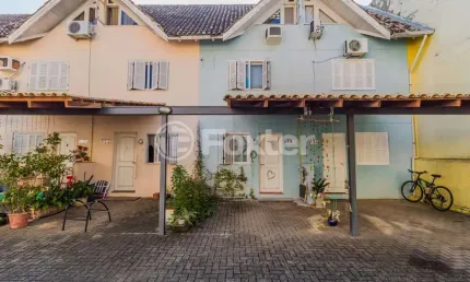 Casa em condomínio fechado com 3 quartos à venda na Rua Doutor Pereira Neto, 1761, Tristeza, Porto Alegre, 79 m2 por R$ 335.000