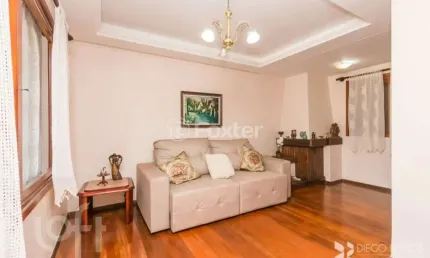 Casa com 3 quartos à venda na Rua Márcio Dias, 196, Nonoai, Porto Alegre, 214 m2 por R$ 850.000