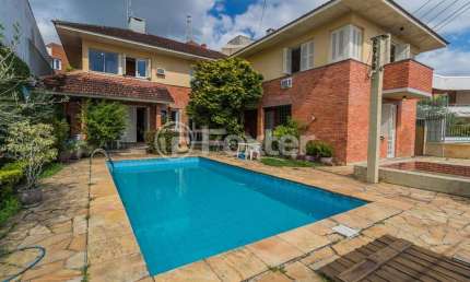 Casa com 5 quartos à venda na Rua Dona Lida Monteiro, 80, Teresópolis, Porto Alegre, 445 m2 por R$ 1.500.000