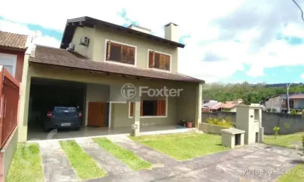 Casa em condomínio fechado com 3 quartos à venda na Rua Erny Ludwig, 135, Mário Quintana, Porto Alegre, 270 m2 por R$ 897.000