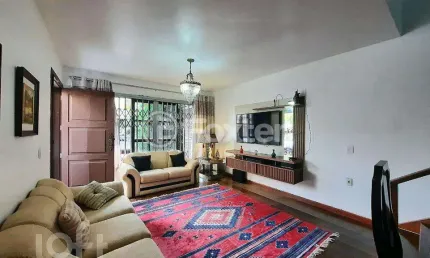 Casa com 3 quartos à venda na Rua Chile, 545, Jardim Botânico, Porto Alegre, 264 m2 por R$ 1.100.000