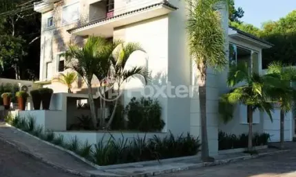 Casa em condomínio fechado com 3 quartos à venda na Avenida Vicente Monteggia, 1020, Cavalhada, Porto Alegre, 240 m2 por R$ 950.000