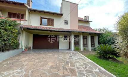 Casa com 3 quartos à venda na Avenida Karl Iwers, 367, Jardim Itu Sabará, Porto Alegre, 242 m2 por R$ 1.100.000