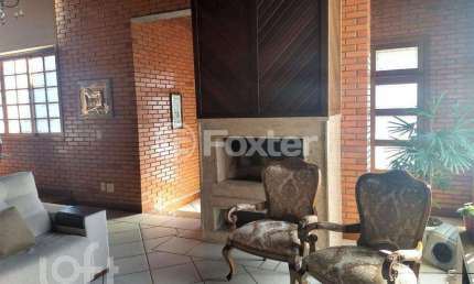 Casa em condomínio fechado com 4 quartos à venda na Rua Alcebíades Antônio dos Santos, 356, Nonoai, Porto Alegre, 495 m2 por R$ 2.500.000