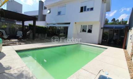 Casa em condomínio fechado com 5 quartos à venda na Rua Ivo Walter Kern, 599, Hípica, Porto Alegre, 332 m2 por R$ 2.064.000