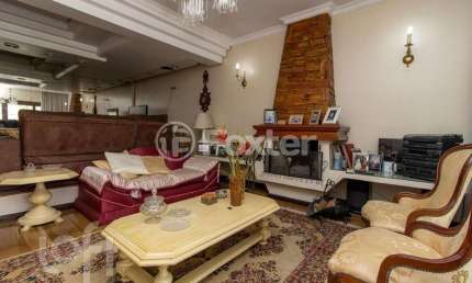 Casa com 4 quartos à venda na Rua Geraldo Souza Moreira, 65, Passo da Areia, Porto Alegre, 147 m2 por R$ 1.100.000