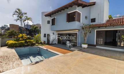 Casa com 4 quartos à venda na Rua Miracema, 15, Chácara das Pedras, Porto Alegre, 394 m2 por R$ 1.650.000