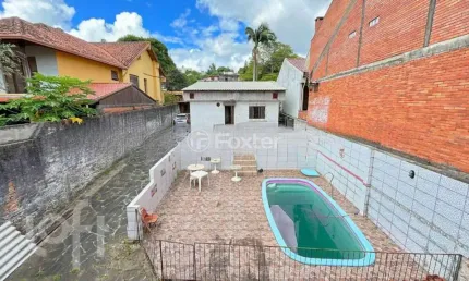 Casa com 3 quartos à venda na Rua Álvaro Nicofé, 150, Vila Jardim, Porto Alegre, 528 m2 por R$ 550.000