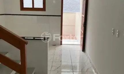 Casa com 2 quartos à venda na Rua Helio Felix Frey, 134, Espírito Santo, Porto Alegre, 86 m2 por R$ 350.000