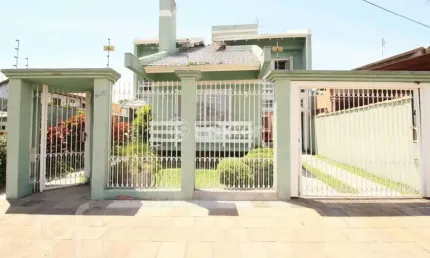 Casa com 4 quartos à venda na Rua Dulcimar Cardoso, 340, Paraíso, Sapucaia do Sul, 340 m2 por R$ 1.060.000