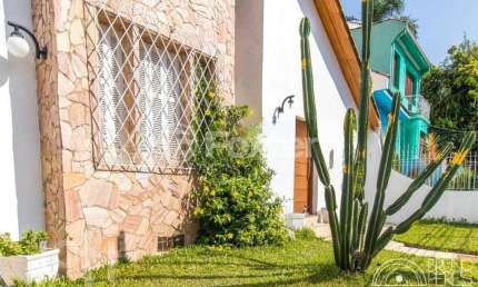 Casa com 6 quartos à venda na Rua Paissandu, 298, Partenon, Porto Alegre, 300 m2 por R$ 1.300.000