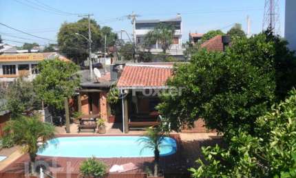 Casa com 3 quartos à venda na Rua Capiberibe, 318, Igara, Canoas, 256 m2 por R$ 1.275.000