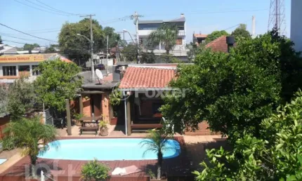 Casa com 3 quartos à venda na Rua Capiberibe, 318, Igara, Canoas, 256 m2 por R$ 1.275.000