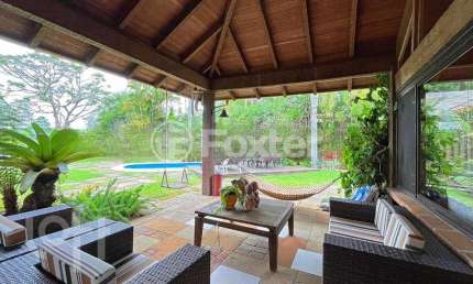Casa em condomínio fechado com 6 quartos à venda na Avenida Juca Batista, 8000, Belém Novo, Porto Alegre, 450 m2 por R$ 2.900.000