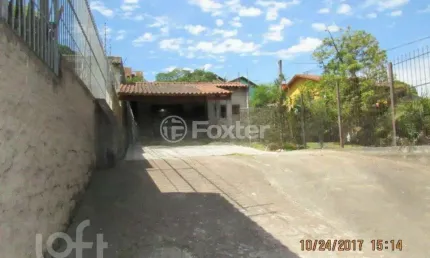 Casa com 3 quartos à venda na Avenida Vicente Monteggia, 2406, Cavalhada, Porto Alegre, 156 m2 por R$ 600.000