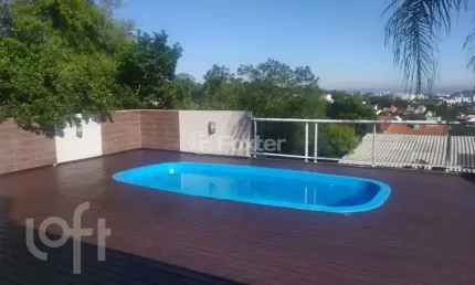 Casa com 3 quartos à venda na Rua Altos da Amapá, 120, Vila Nova, Porto Alegre, 300 m2 por R$ 1.090.000