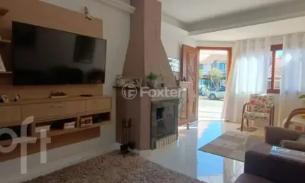 Casa com 3 quartos à venda na rua edgar sanches laurent, 46, hípica, porto alegre, 180 m2 por r$ 750.000