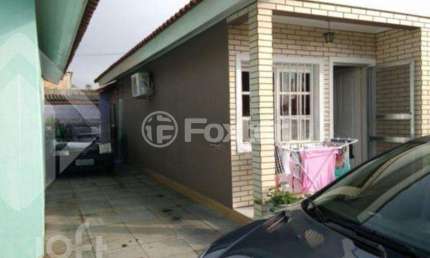 Casa em condomínio fechado com 2 quartos à venda na Rua Engenheiro Kindler, 1320, Harmonia, Canoas, 57 m2 por R$ 270.000