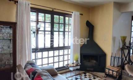 Casa com 3 quartos à venda na Rua Itaboraí, 1335, Jardim Botânico, Porto Alegre, 266 m2 por R$ 1.600.000