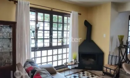 Casa com 3 quartos à venda na rua itaboraí, 1335, jardim botânico, porto alegre, 266 m2 por r$ 1.600.000