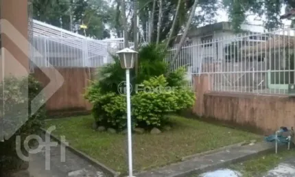 Casa com 3 quartos à venda na Rua Tobias Barreto, 180, Partenon, Porto Alegre, 224 m2 por R$ 940.000