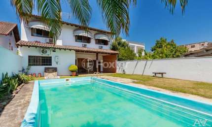 Casa com 3 quartos à venda na Rua Pedro de Oliveira Bittencourt, 103, Tristeza, Porto Alegre, 324 m2 por R$ 1.800.000
