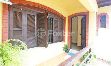 Casa com 3 quartos à venda na Rua Umbú, 137, Passo da Areia, Porto Alegre, 154 m2 por R$ 1.280.000