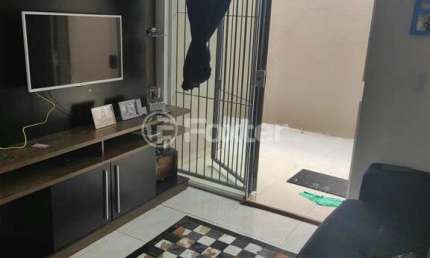 Casa em condomínio fechado com 2 quartos à venda na Avenida Doutor Sezefredo Azambuja Vieira, 5995, Olaria, Canoas, 36 m2 por R$ 200.100