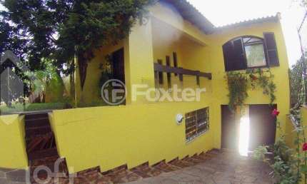 Casa com 3 quartos à venda na Rua Vinícius de Moraes, 174, Marechal Rondon, Canoas, 175 m2 por R$ 890.000