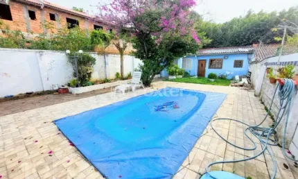 Casa com 3 quartos à venda na rua sebastião wolf, 181, nonoai, porto alegre, 180 m2 por r$ 870.000