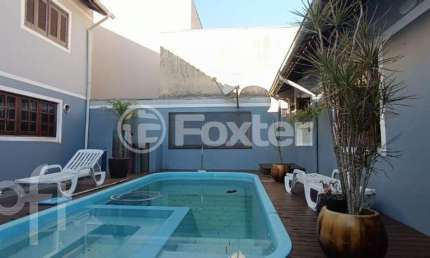 Casa com 3 quartos à venda na Rua Suécia, 209, Marechal Rondon, Canoas, 190 m2 por R$ 1.225.000