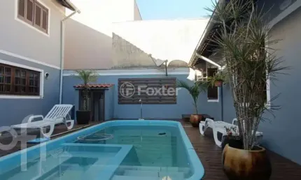 Casa com 3 quartos à venda na Rua Suécia, 209, Marechal Rondon, Canoas, 190 m2 por R$ 1.300.000