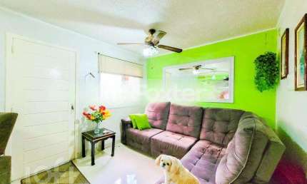 Casa em condomínio fechado com 3 quartos à venda na Rua dos Guamirins, 303, Igara, Canoas, 107 m2 por R$ 411.000