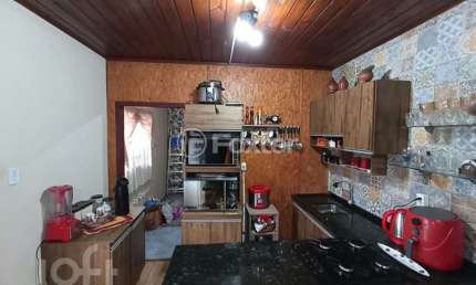 Casa com 3 quartos à venda na Rua Darcy Cristiano Bernardi, 22, Olaria, Canoas, 200 m2 por R$ 650.000