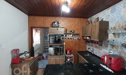Casa com 3 quartos à venda na Rua Darcy Cristiano Bernardi, 22, Olaria, Canoas, 200 m2 por R$ 650.000