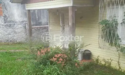 Casa com 2 quartos à venda na Rua Teixeira de Carvalho, 162, Medianeira, Porto Alegre, 390 m2 por R$ 390.000
