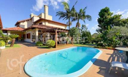 Casa em condomínio fechado com 4 quartos à venda na Avenida das Acácias, 360, Jardim do Cedro, Gravataí, 530 m2 por R$ 3.650.000