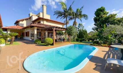 Casa em condomínio fechado com 4 quartos à venda na Avenida das Acácias, 360, Jardim do Cedro, Gravataí, 530 m2 por R$ 3.650.000