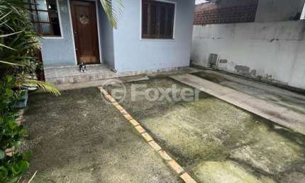 Casa com 3 quartos à venda na Rua Nebraska, 64, Mato Grande, Canoas, 70 m2 por R$ 410.000