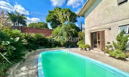 Casa com 4 quartos à venda na Rua Guilherme Vielitz, 467, Canudos, Novo Hamburgo, 220 m2 por R$ 585.000