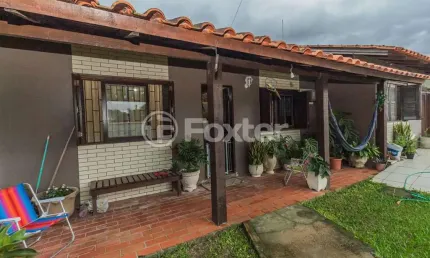Casa com 3 quartos à venda na Rua Emílio Dimari, 190, Ponta Grossa, Porto Alegre, 130 m2 por R$ 530.000