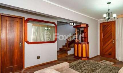 Casa com 3 quartos à venda na Rua Vicente Marsiglia Filho, 206, Jardim Leopoldina, Porto Alegre, 200 m2 por R$ 655.000